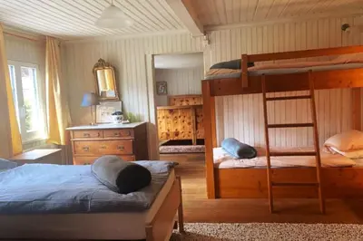 Ein Bett oder Betten in einem Zimmer der Unterkunft Wunderschönes Chalet Stöckli