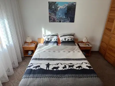 Ein Bett oder Betten in einem Zimmer der Unterkunft Splendide vue avec calme