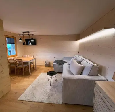 Ein Sitzbereich in der Unterkunft Chalet La Montanara