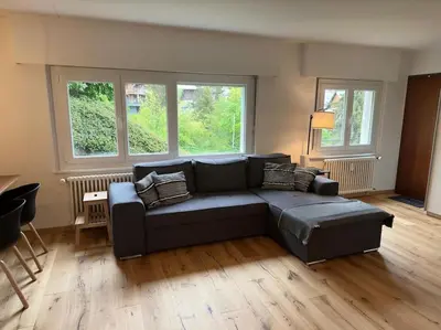 Ein Sitzbereich in der Unterkunft Appartement central avec Spa