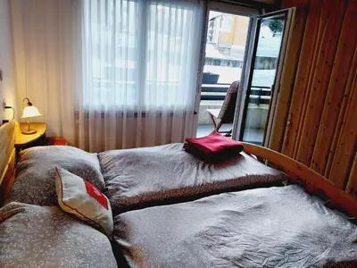 Ein Bett oder Betten in einem Zimmer der Unterkunft Sky Haus Residence inkl parking