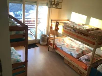 Ein Bett oder Betten in einem Zimmer der Unterkunft Grand 4,5 pièces rénové et lumineux