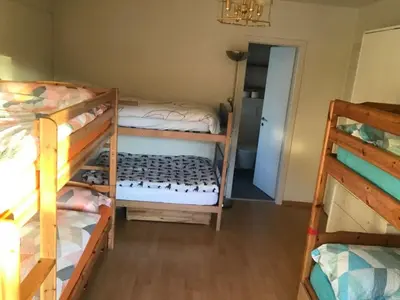 Ein Bett oder Betten in einem Zimmer der Unterkunft Grand 4,5 pièces rénové et lumineux