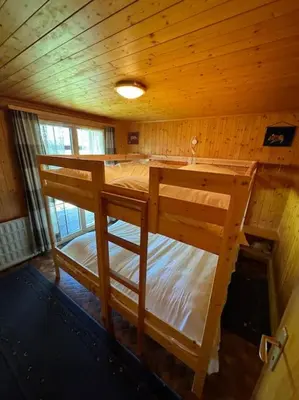 Ein Bett oder Betten in einem Zimmer der Unterkunft Chalet Glücksfall