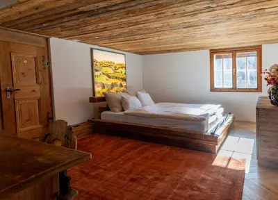 Ein Bett oder Betten in einem Zimmer der Unterkunft Modernes Chalet mit Sauna, Whirlpool und Bergblick