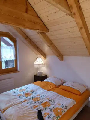 Ein Bett oder Betten in einem Zimmer der Unterkunft Haus am See