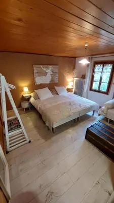 Ein Bett oder Betten in einem Zimmer der Unterkunft Auberge Restaurant les Aiguilles Rouges