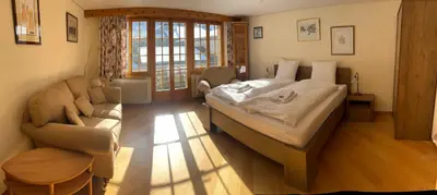 Ein Bett oder Betten in einem Zimmer der Unterkunft Chalet Bärli