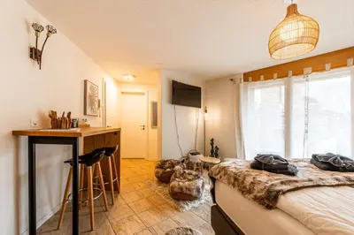 Ein Bett oder Betten in einem Zimmer der Unterkunft Cozy Chamia Studio