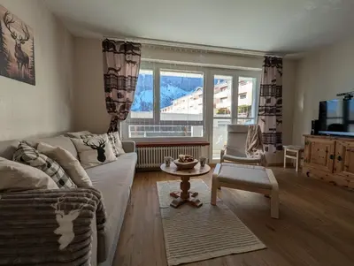 Ein Sitzbereich in der Unterkunft Alpine Siesta