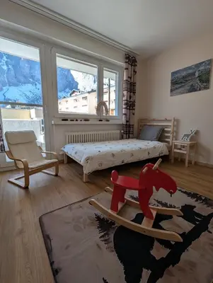 Ein Bett oder Betten in einem Zimmer der Unterkunft Alpine Siesta