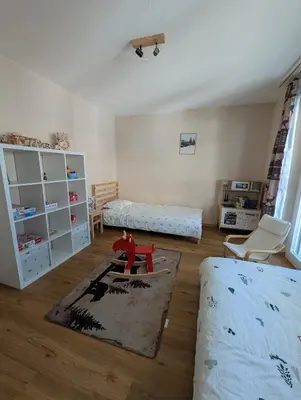 Ein Bett oder Betten in einem Zimmer der Unterkunft Alpine Siesta
