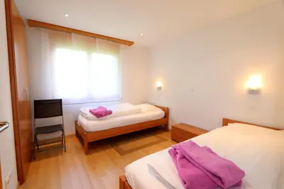Ein Bett oder Betten in einem Zimmer der Unterkunft Aramis