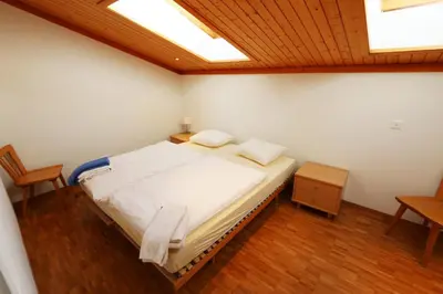 Ein Bett oder Betten in einem Zimmer der Unterkunft Haus Cristal