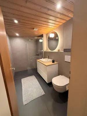 Ein Badezimmer in der Unterkunft 3,5 Zimmer Wohnung Eigerblick zentral in Grindelwald