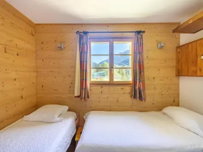 Ein Bett oder Betten in einem Zimmer der Unterkunft Chalet Verrel near Aletsch Ski Gondolas