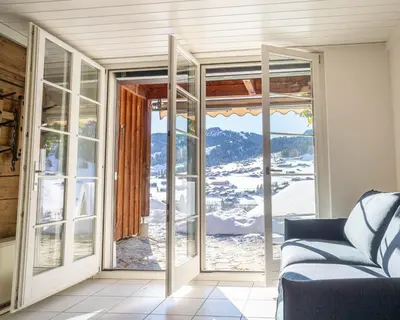Ein Sitzbereich in der Unterkunft Chalet Bächlerhaus