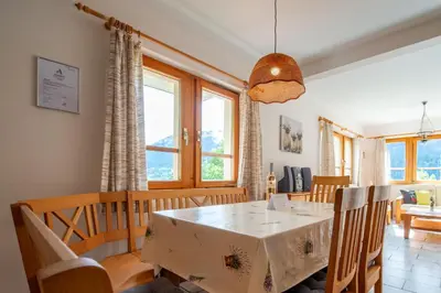 Ein Sitzbereich in der Unterkunft Chalet Pantke