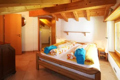Ein Bett oder Betten in einem Zimmer der Unterkunft Dominic B