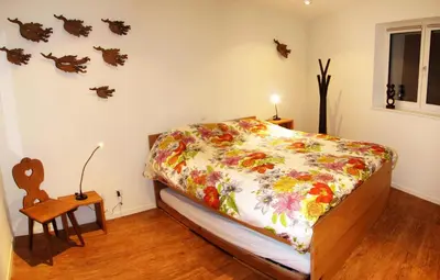 Ein Bett oder Betten in einem Zimmer der Unterkunft Dolomit