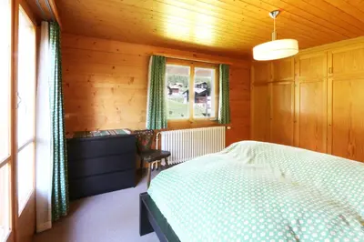 Ein Bett oder Betten in einem Zimmer der Unterkunft Chalet les Mayens