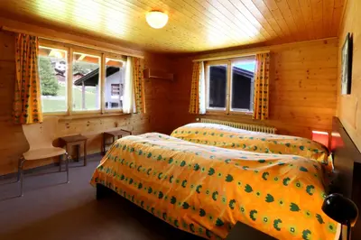 Ein Bett oder Betten in einem Zimmer der Unterkunft Chalet les Mayens