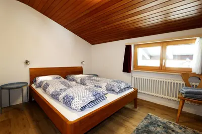 Ein Bett oder Betten in einem Zimmer der Unterkunft Adora