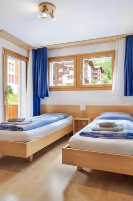 Ein Bett oder Betten in einem Zimmer der Unterkunft Haus Snow Fun B