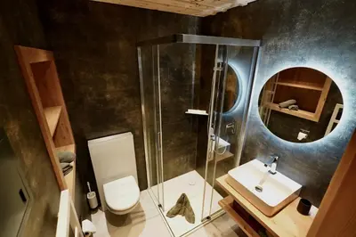 Ein Badezimmer in der Unterkunft Chalet Schwendiboden