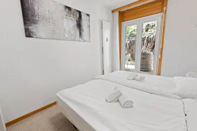 Ein Bett oder Betten in einem Zimmer der Unterkunft Appartement paisible au pied des pistes de ski