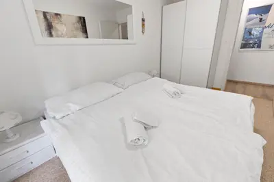 Ein Bett oder Betten in einem Zimmer der Unterkunft Appartement paisible au pied des pistes de ski