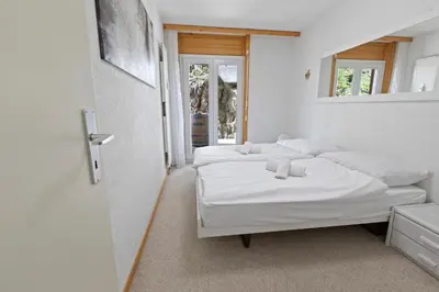 Ein Bett oder Betten in einem Zimmer der Unterkunft Appartement paisible au pied des pistes de ski