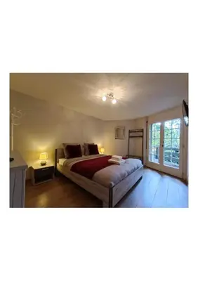 Ein Bett oder Betten in einem Zimmer der Unterkunft Le Bargeot à Baar