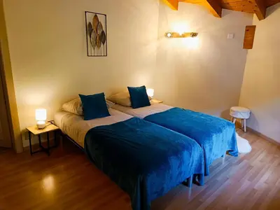 Ein Bett oder Betten in einem Zimmer der Unterkunft Le Bargeot à Baar