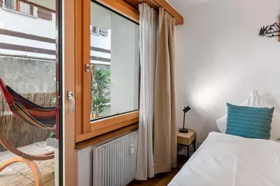 Ein Bett oder Betten in einem Zimmer der Unterkunft Centre de Saas-Fee - 2 chambres - balcon & patio