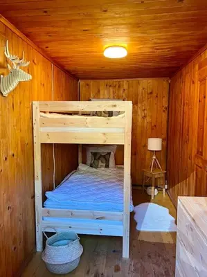 Ein Bett oder Betten in einem Zimmer der Unterkunft Appartement Le Moulin - 1771
