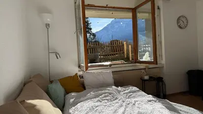 Ein Bett oder Betten in einem Zimmer der Unterkunft Meiringen Retreat - Sauna, Terrace & Pinball