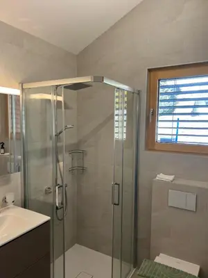 Ein Badezimmer in der Unterkunft Maison Panorama Alpes Suisses & Sauna