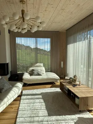Ein Bett oder Betten in einem Zimmer der Unterkunft Maison Panorama Alpes Suisses & Sauna