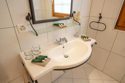 Ein Badezimmer in der Unterkunft Ferienapartments Chalet Solvay