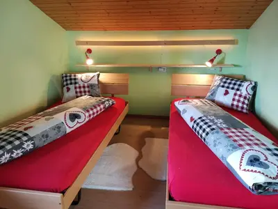 Ein Bett oder Betten in einem Zimmer der Unterkunft Fortuna