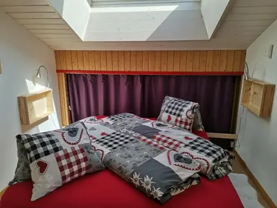 Ein Bett oder Betten in einem Zimmer der Unterkunft Fortuna