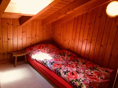 Ein Bett oder Betten in einem Zimmer der Unterkunft Chalet Papillon
