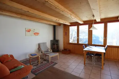 Ein Sitzbereich in der Unterkunft Chalet Les Pyramides