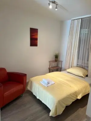 Ein Bett oder Betten in einem Zimmer der Unterkunft Studio 104 - Riverside