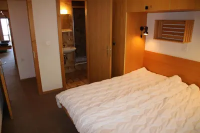 Ein Bett oder Betten in einem Zimmer der Unterkunft Mélèzes S 023- SKI LIFT apartment 6 pers