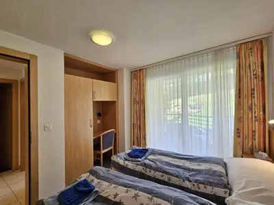 Ein Bett oder Betten in einem Zimmer der Unterkunft Nicoletta