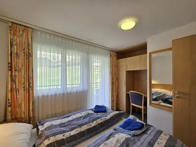 Ein Bett oder Betten in einem Zimmer der Unterkunft Nicoletta