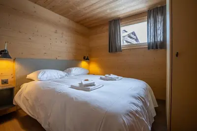 Ein Bett oder Betten in einem Zimmer der Unterkunft Chalet Onno Henny