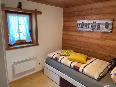 Ein Bett oder Betten in einem Zimmer der Unterkunft Chalet Bildji